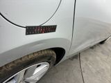 a close up of a car with a sticker on the side of it