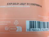 an orange bag of food with a barcode on the side of it