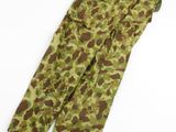 a close up of a pair of camouflage pants on a white surface