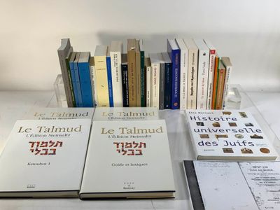 many books that are sitting on a table