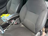 two black seats in the back of a car