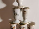 five cups stacked on top of each other on a table