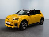 un SUV jaune garé dans une pièce blanche au sol noir