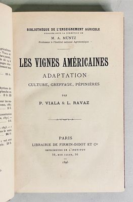 an open book on a table with a black and white image of the title