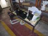 an image of a cluttered room with many items on the table