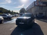 a car that is parked in front of a building