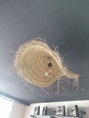 a light that is hanging from the ceiling in the room
