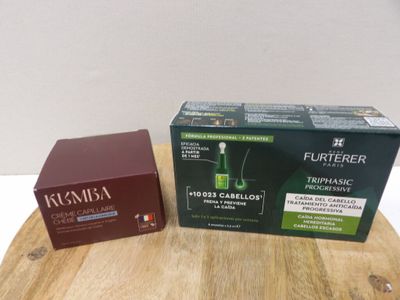 two boxes of wine sitting on a table next to each other