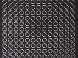 a black and white photo of a square of rings on a black background