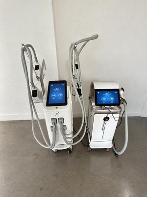two medical equipment sitting next to each other in a room