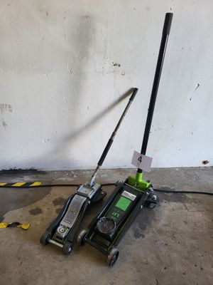 two jacks that are sitting on the ground