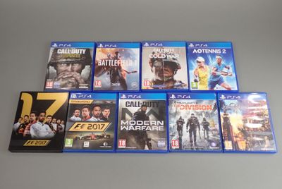 a bunch of video games sitting on top of a table
