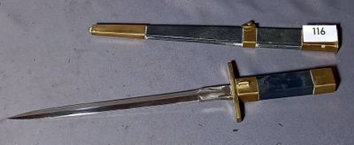two knives that are sitting on a table