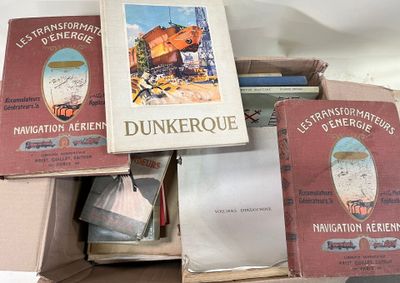 plusieurs livres sont empilés sur une table