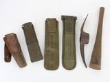 several different types of knives and sheaths laid out on a white surface