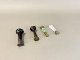 three different types of metal items are shown on a white surface
