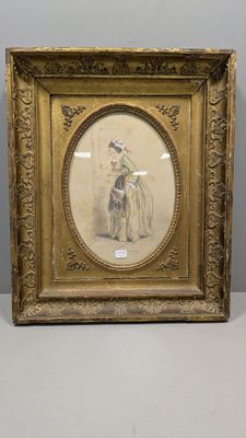 une vieille photo d'une femme à cheval, dans un cadre doré