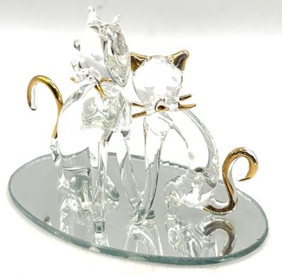 Figurine en verre filé sur un socle miroir à décor de dorure représent