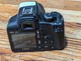 a camera that is sitting on a wooden table