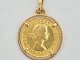 an image of a gold coin with a crown on it