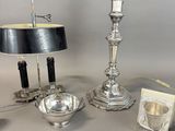 a lot of silver items that are on the table