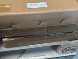 a box on a pallet with a sticker on it