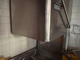 an image of a kitchen with a sink and a stove