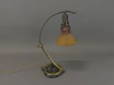 an image of a table lamp with a glass shade on top of it