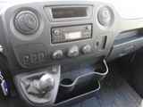 a dashboard of a car with a radio and a steering control