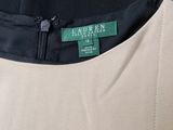 a close up of the back of a dress with a label on it