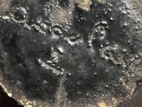 a close up of a metal object on a table