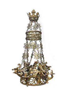 an antique brass chandelier with a crown and angels