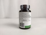 a close up of a bottle of vitamin supplement sitting on a table
