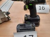 a cordless drill that is sitting on a table