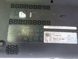 a close up of a laptop with a sticker on it