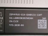 a close up of a computer with a qr code on it