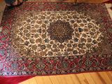 a large oriental rug on the floor in a living room