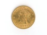l'image d'une pièce d'or sur laquelle figure une tête de femme