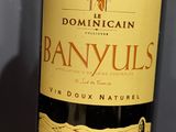 a bottle of wine that is sitting on a table