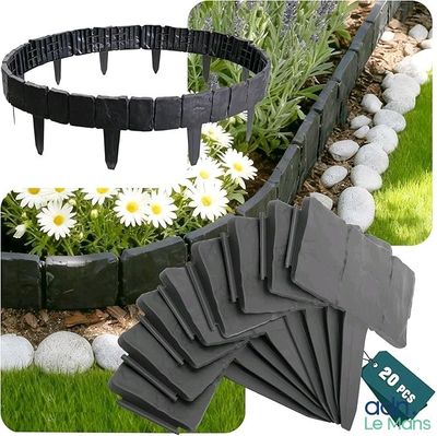 un gros plan sur un lot de bordures de jardin en plastique noir