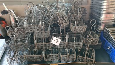 a pile of baskets that are sitting on a table