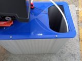 an image of a blue and black box with a tv in it