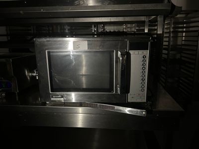 a microwave that is sitting on top of a table