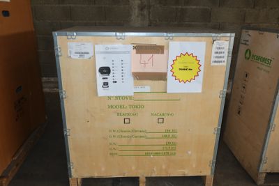 two boxes that are sitting next to each other on a pallet