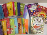 a lot of children ' s books that are on the table