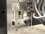 a close up of a machine with a bunch of wires attached to it