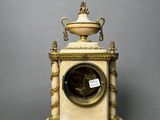 a clock that is sitting on top of a table