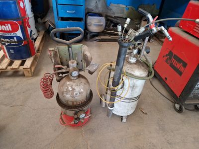 many different types of industrial equipment in a garage