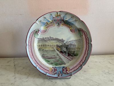 a plate with a picture of a train on it