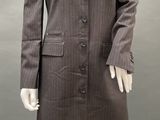 a mannequin wearing a suit and tie on a mannequin
